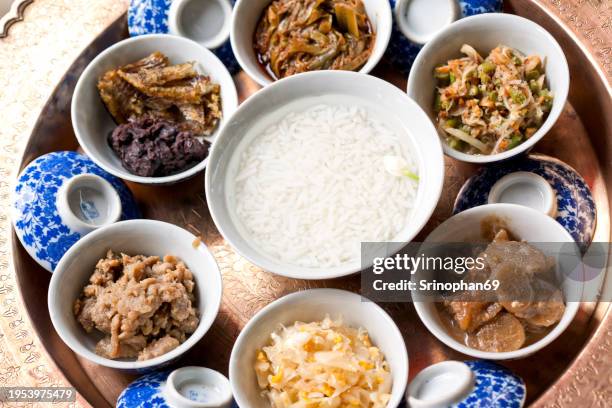 khao chae: a taste of thai tradition with the chilled elegance of authentic rice dish - royal variety stock pictures, royalty-free photos & images