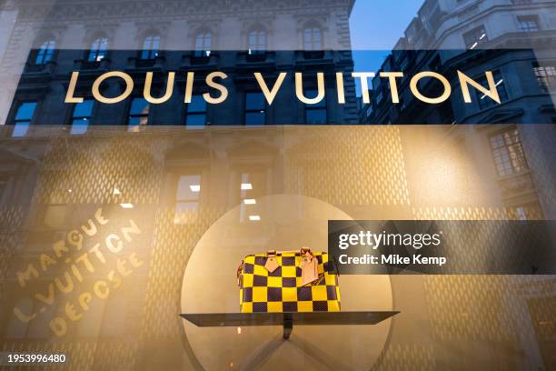 Designer handbag in the shop window of Louis Vuitton store in the City of London on 18th January 2024 in London, United Kingdom. Louis Vuitton...