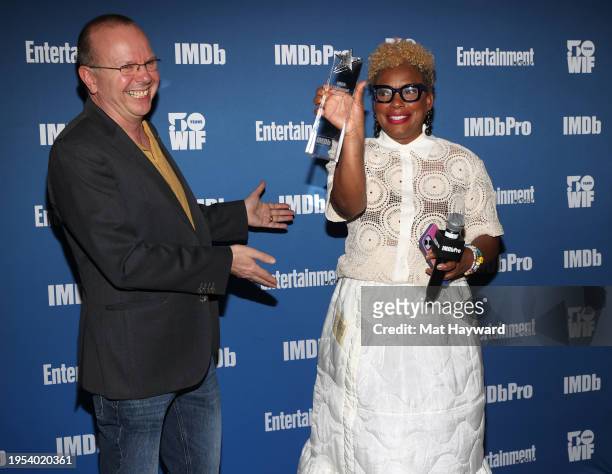 Col Needham presents Aunjanue Ellis-Taylor with the IMDb "Fan Favorite" STARmeter Award during the IMDb, WIF, and Entertainment Weekly Dinner Party...