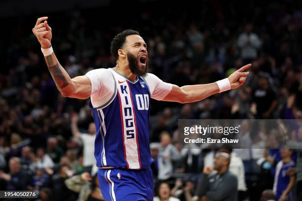 JaVale McGee of the Sacramento Kings reacts after he dunked the ball against the Atlanta Hawks in the second half at Golden 1 Center on January 22,...