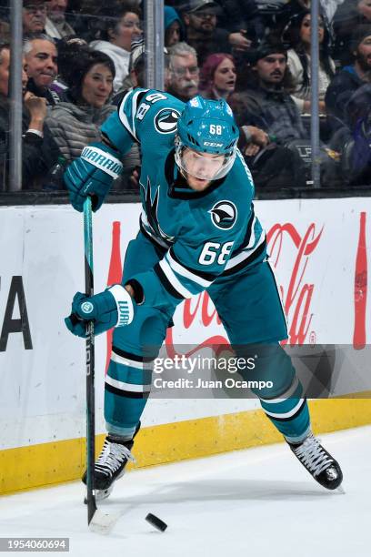 Mike Hoffman of the San Jose Sharks skates with the puck during the second period against the Los Angeles Kings at Crypto.com Arena on January 22,...