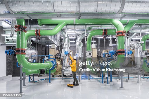 Operation Engineer Working At Industrial Factory And Pipeline High-Res ...