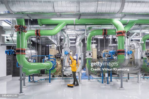 operation engineer working at industrial factory and pipeline - image technique stock pictures, royalty-free photos & images