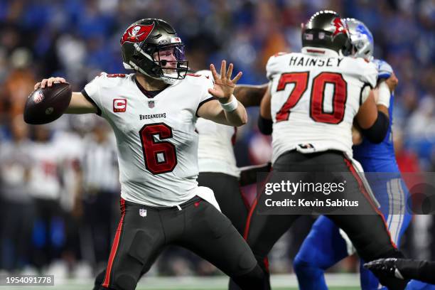 Baker Mayfield of the Tampa Bay Buccaneers throws a pass during an NFL divisional round playoff football game against the Detroit Lions at Ford Field...