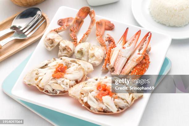 gastronomic delight: steamed egg crab, a culinary masterpiece in asian cuisine - bollito foto e immagini stock