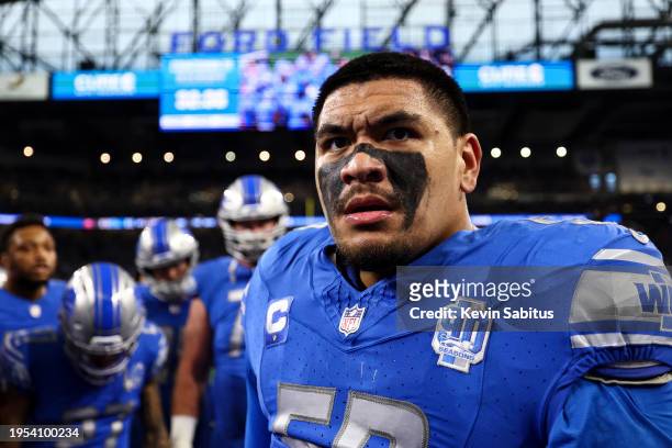 Penei Sewell of the Detroit Lions gives a speech in the team huddle prior to an NFL divisional round playoff football game against the Tampa Bay...