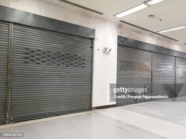 rolling steel door shop - rolling stock pictures, royalty-free photos & images