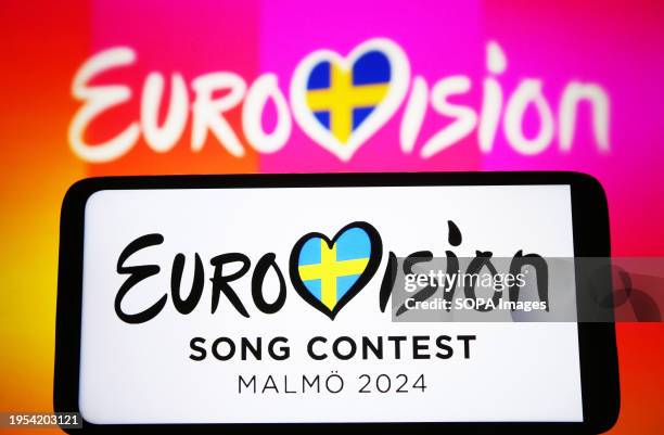 In this photo illustration, Eurovision Song Contest 2024 logo is seen on a smartphone and a pc screen. The Eurovision Song Contest 2024 is scheduled...