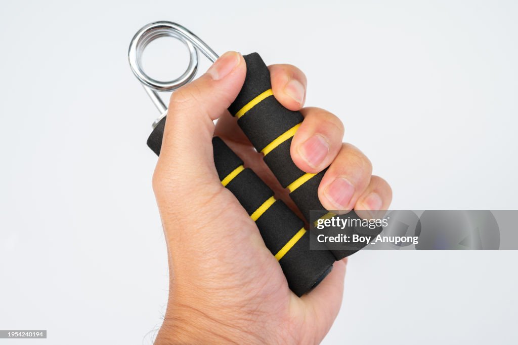 Cropped shot view of men's hand handle a hand grip for exercise against white background.
