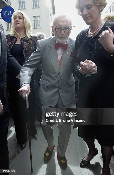 Actor Sir John Mills on Baker street after the unveiling of a Musical Heritage Plaque for John Lennon which was placed on the old Apple Records...