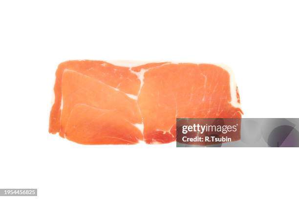 closeup on a piece of spanish serrano ham - cure 2013 stock pictures, royalty-free photos & images