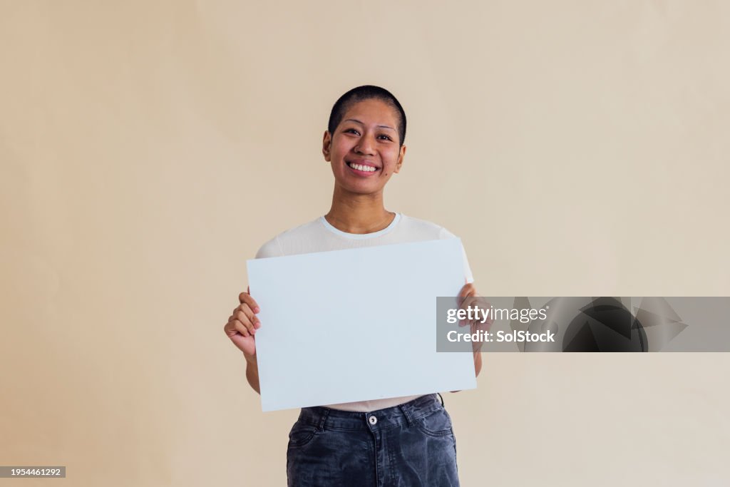 Holding a Blank Sign