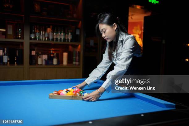 young woman preparing for billiards - xiamen stock pictures, royalty-free photos & images