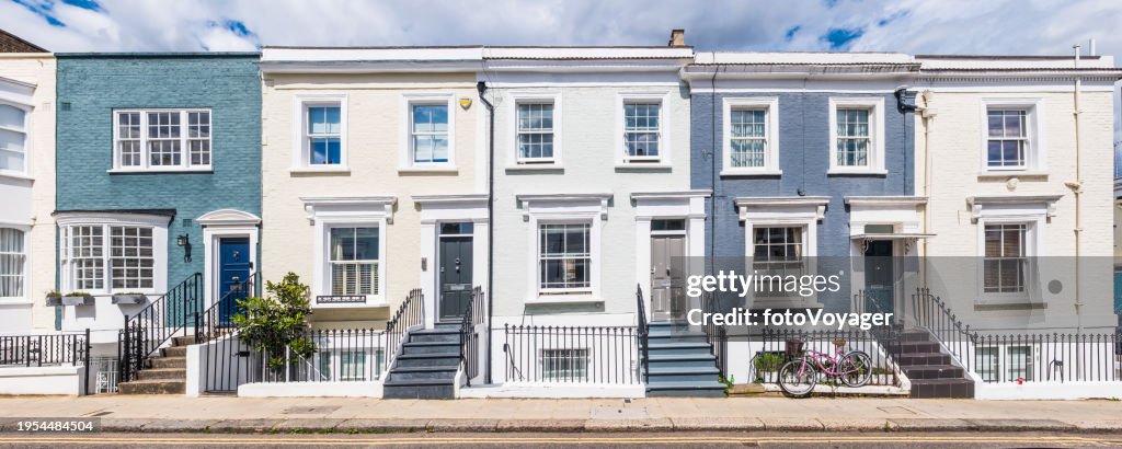 Row of period townhouse farmily homes terrace street panorama