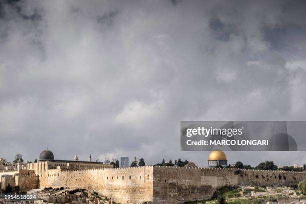 This picture shows a view of the al-Aqsa mosque compound with the Dome of the Rock mosque on a rainy day in east Jerusalem on January 26, 2024.