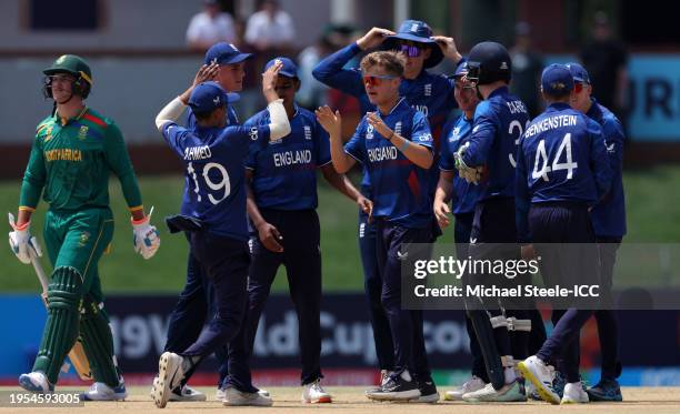 Jaydn Denly of England celebrates the wicket of David Teegar of South Africa during the ICC U19 Men's Cricket World Cup South Africa 2024 match...