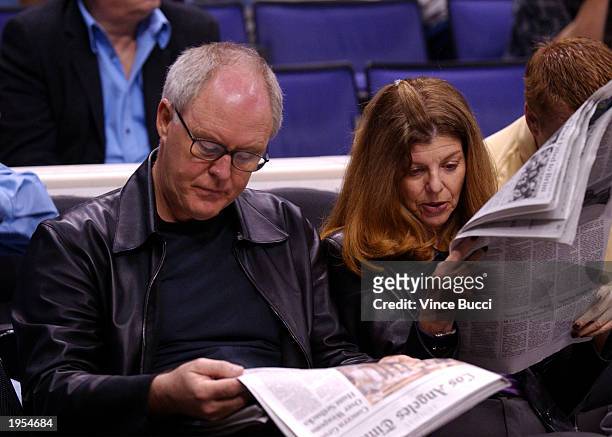 Actor John lithgow and wife, Mary Yeager, wait for the start of the Lakers v Timberwolves in game 4 of the first round of the 2003 NBA playoffs at...