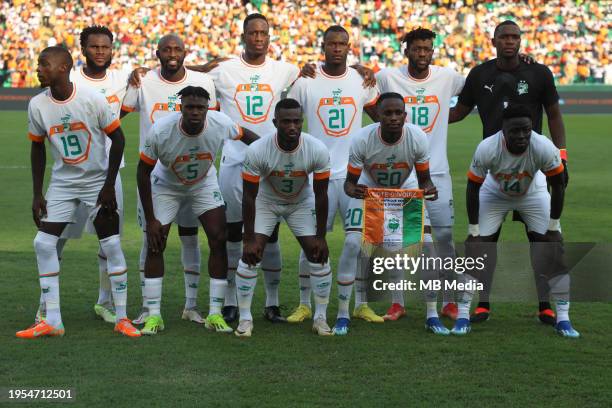 The Ivory Coast team line up for a team photo before the TotalEnergies CAF Africa Cup of Nations group stage match between Equatorial Guinea and...