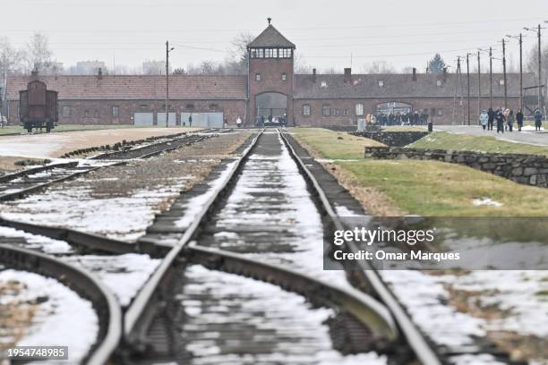 View of the entrance gate at the former Nazi death camp Auschwitz Birkenau on January 23, 2024 in Oswiecim, Poland. Among the attendees were...