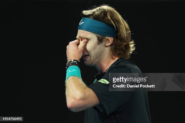 Andrey Rublev reacts in their quarterfinals singles match against Jannik Sinner of Italy during the 2024 Australian Open at Melbourne Park on January...