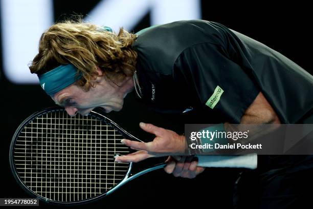 Andrey Rublev reacts in their quarterfinals singles match against Jannik Sinner of Italy during the 2024 Australian Open at Melbourne Park on January...