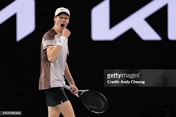 Jannik Sinner of Italy celebrates set point in their quarterfinals singles match against Andrey Rublev during day ten of the 2024 Australian Open at...