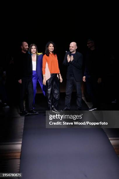 Creative director Goga Ashkenazi and contributing designer Hussein Chalayan walk the runway at the Vionnet show during Paris Fashion Week...