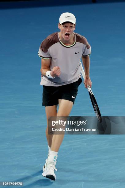 Jannik Sinner of Italy celebrates set point in their quarterfinals singles match against Andrey Rublev during the 2024 Australian Open at Melbourne...