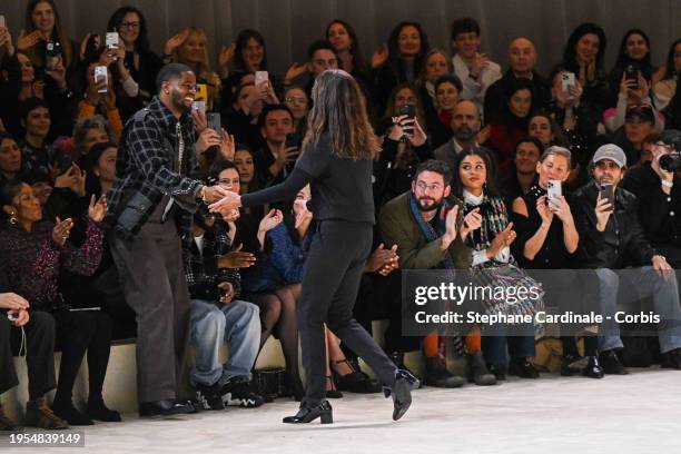 Designer Virginie Viard acknowledges the applause of Naomi Campbell and Kendrick Lamar after the Chanel Haute Couture Spring/Summer 2024 show as part...