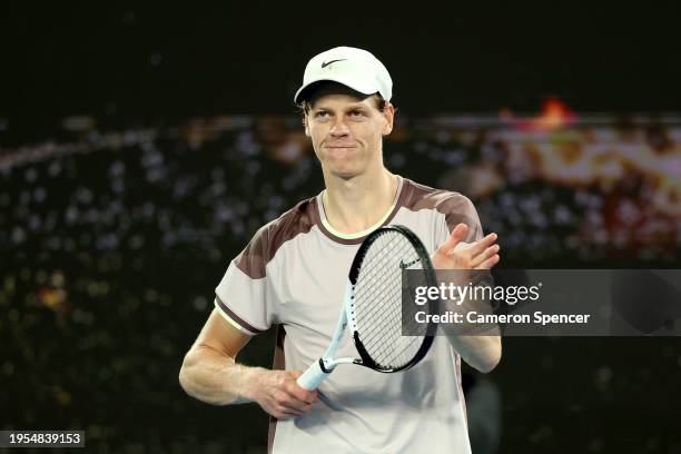 Jannik Sinner of Italy celebrates match point in their quarterfinals singles match against Andrey Rublev during the 2024 Australian Open at Melbourne...