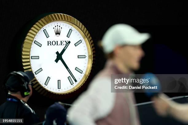 The clock shows the time as 1:24am as Jannik Sinner of Italy is interviewed after winning his quarterfinals singles match against Andrey Rublev...