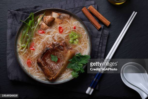 chilli beef ramen with noodles - soup bowl stock pictures, royalty-free photos & images