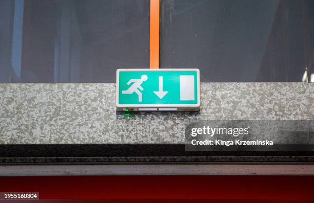 emergency exit sign - safety icon stock pictures, royalty-free photos & images