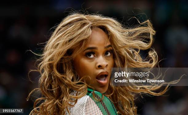 Boston Celtics dancer performs during the second quarter of the game between the Boston Celtics and the Cleveland Cavaliers at TD Garden on December...
