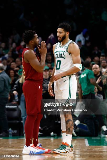 Jayson Tatum of the Boston Celtics and Donovan Mitchell of the Cleveland Cavaliers after their game at TD Garden on December 14, 2023 in Boston,...