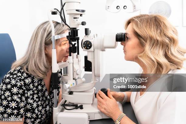 female ophthalmologist in her own modern clinic - eyesight stock pictures, royalty-free photos & images