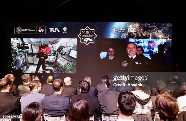 Turkish Minister of Industry and Technology Mehmet Fatih Kacir speaks with the first Turkish space traveler, Alper Gezeravci, currently conducting...