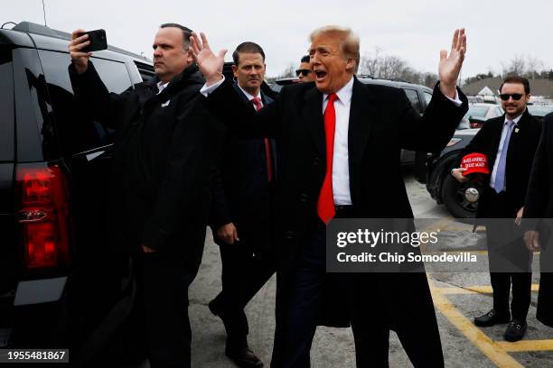 Republican presidential candidate, former U.S. President Donald Trump visits a polling site at Londonderry High School on primary day, on January 23,...