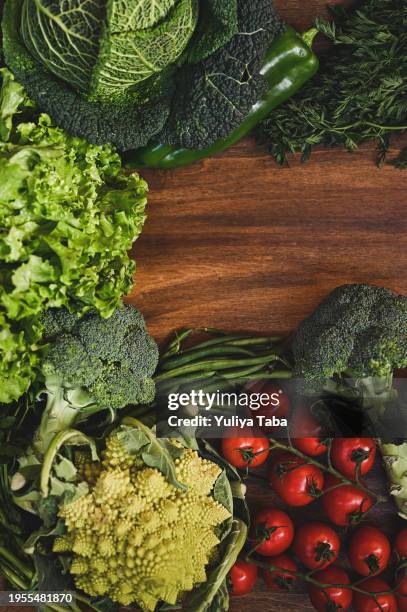 nutrition concept. raw vegetables on a wooden table. - succulent frame stock pictures, royalty-free photos & images