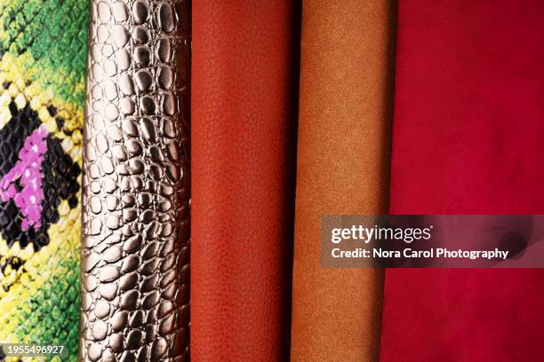 stack of colorful leather - rough scale python fotografías e imágenes de stock