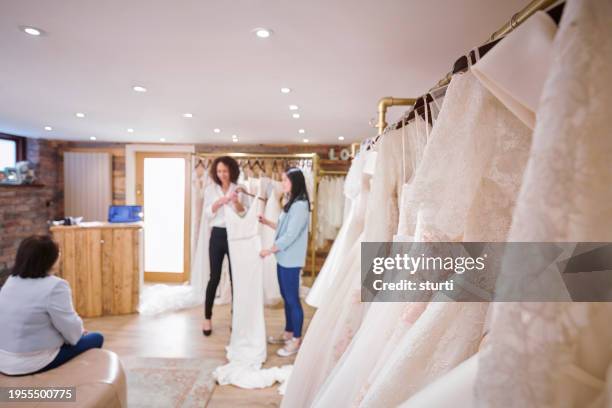 wedding dress shopping - bridal shop stock pictures, royalty-free photos & images