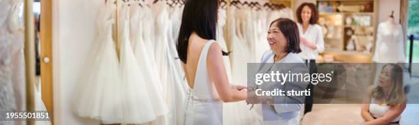 proud mother of the bride - bridal shop stock pictures, royalty-free photos & images