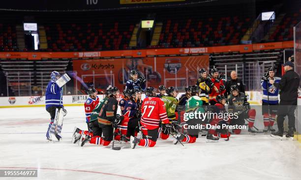 Team Red with coaches during the practice session for the 2024 Kubota CHL Top Prospects Game at Avenir Centre on January 23, 2024 in Moncton, Canada.