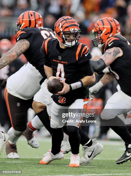 McCarron of the Cincinnati Bengals prepares to hand the ball off during the game against the Cleveland Browns at Paycor Stadium on January 07, 2024...