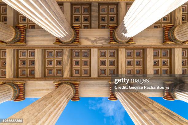 columns in classical greek architectural style - ionisch stock-fotos und bilder