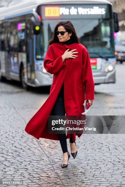 Barbara Martelo wears red coat outside Chanel during the Haute Couture Spring/Summer 2024 as part of Paris Fashion Week on January 23, 2024 in Paris,...