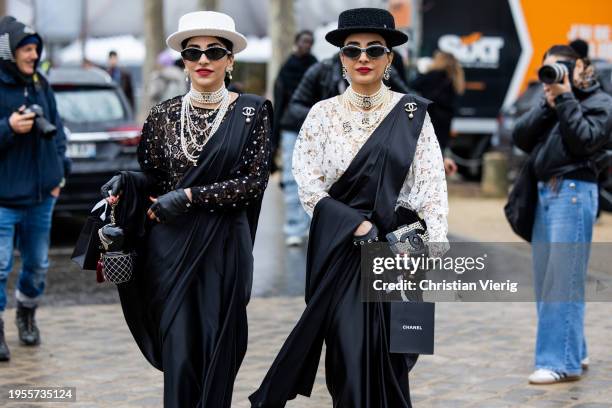 Twins Snehal and Jyoti Babani wears hat, necklace , logos outside Chanel during the Haute Couture Spring/Summer 2024 as part of Paris Fashion Week on...