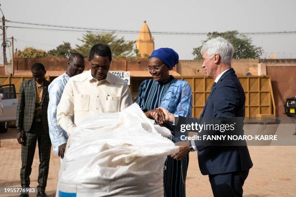 Burkina Faso's Minister of Foreign Affairs Karamoko Jean-Marie Traore , Burkina Faso's Minister of Solidarity, Humanitarian Action, National...