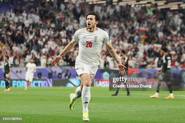 Sardar Azmoun of Iran celebrates during the AFC Asian Cup Group C match between Iran and United Arab Emirates at Education City Stadium on January...