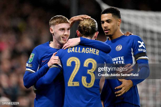 Cole Palmer of Chelsea celebrates scoring his team's fifth goal with teammates Conor Gallagher and Levi Colwill during the Carabao Cup Semi Final...